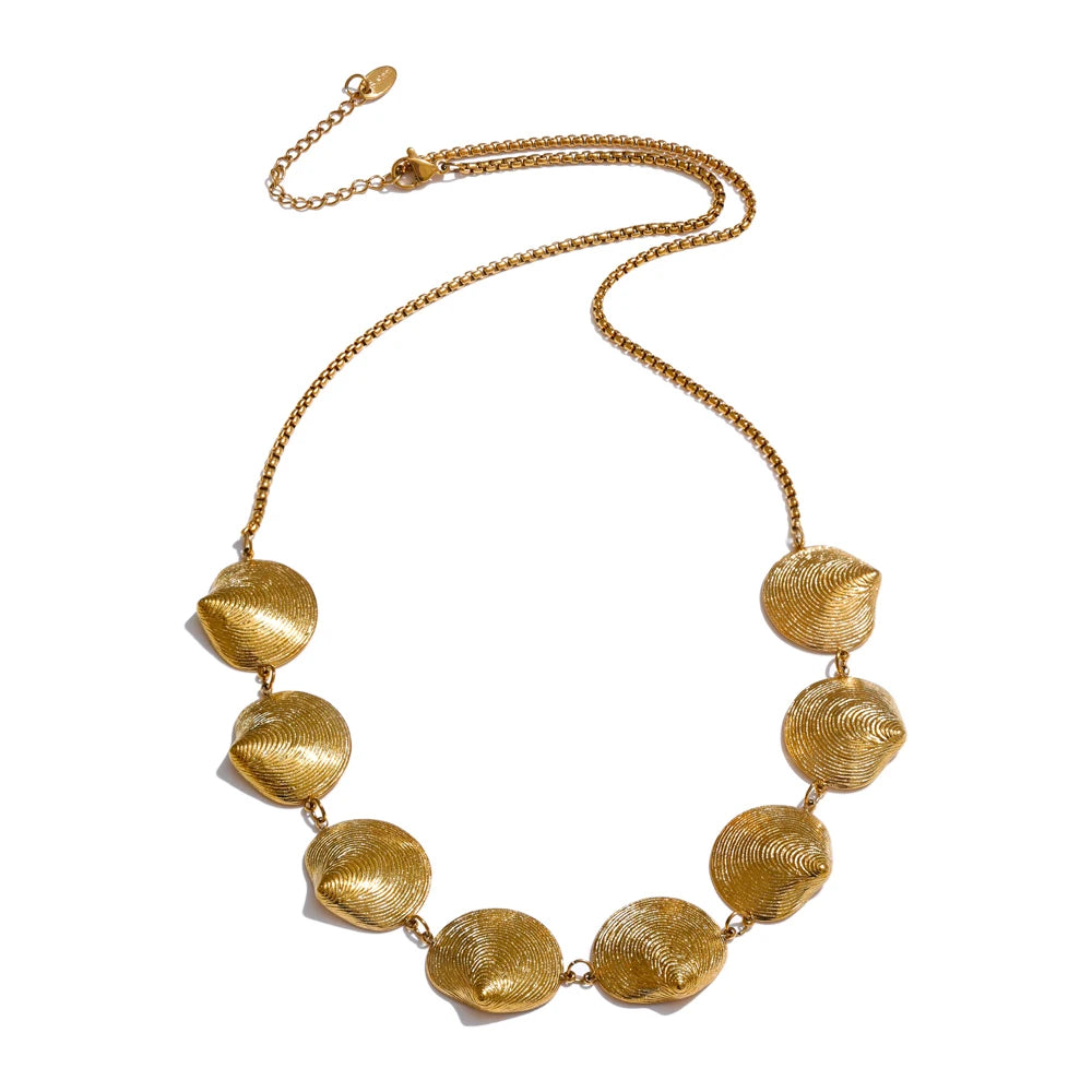 Classic gold i necklace design that complements earrings and gold