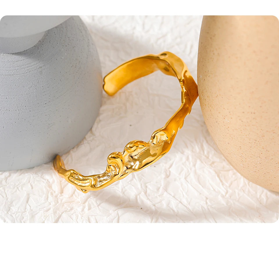Edgy gold color bracelet without clasp slip on style