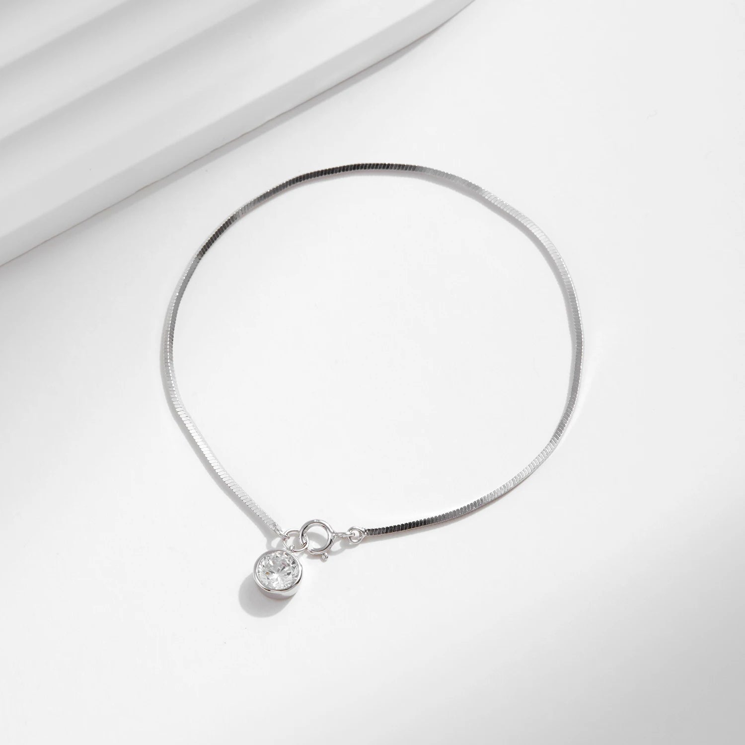 Bracelet with gold detail paired with a smooth sterling silver profile