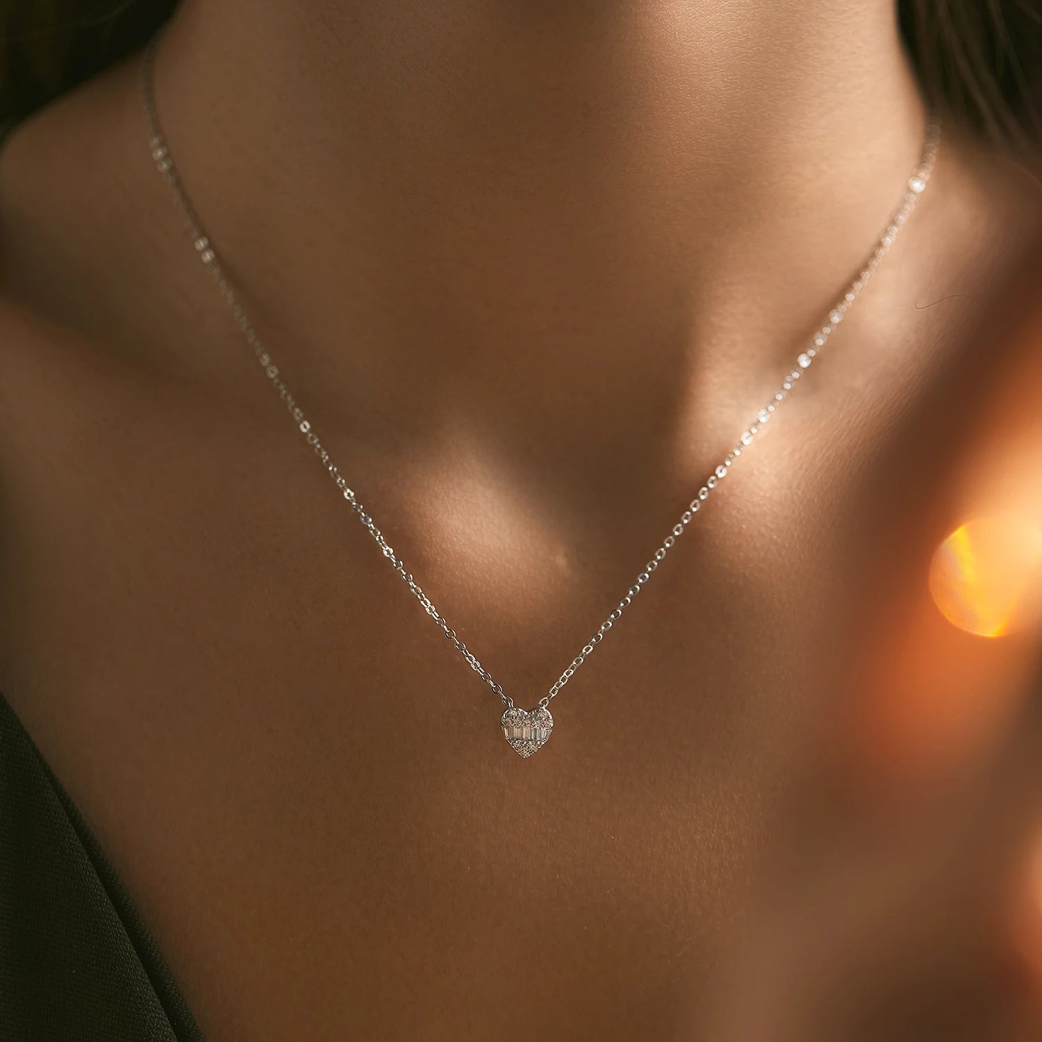 Silver heart pendant necklace featuring zirconia for refined shine