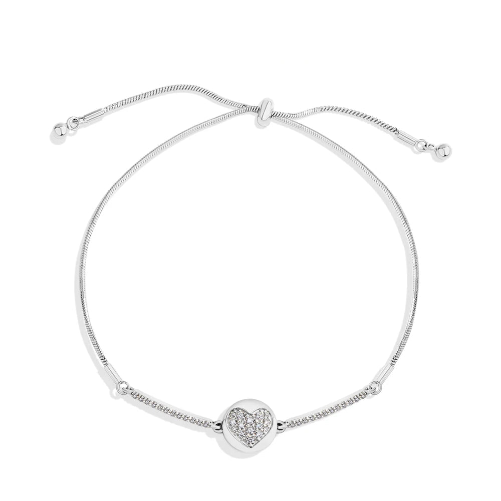 Love bracelet with gold heart set with moissanite diamond in 925 sterling silver