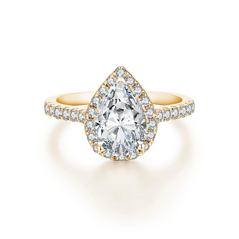 Ring size from ring guide beside a Pear Cut moissanite engagement ring