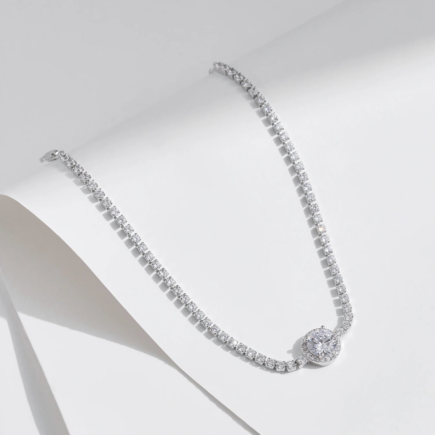 Close view of cubic zirconia set on a 925 silver tennis bracelet