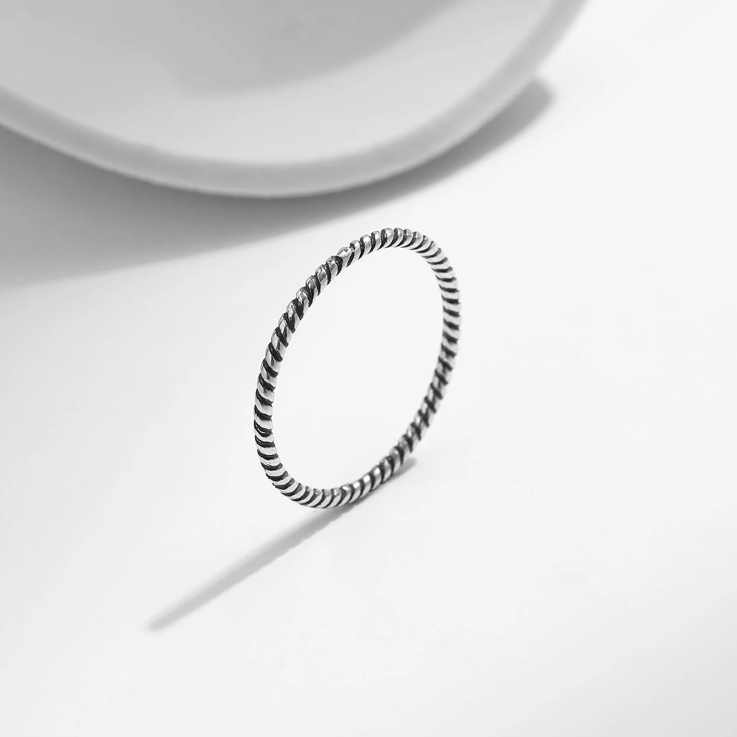 Classic 925 sterling silver band styled for ring stacking