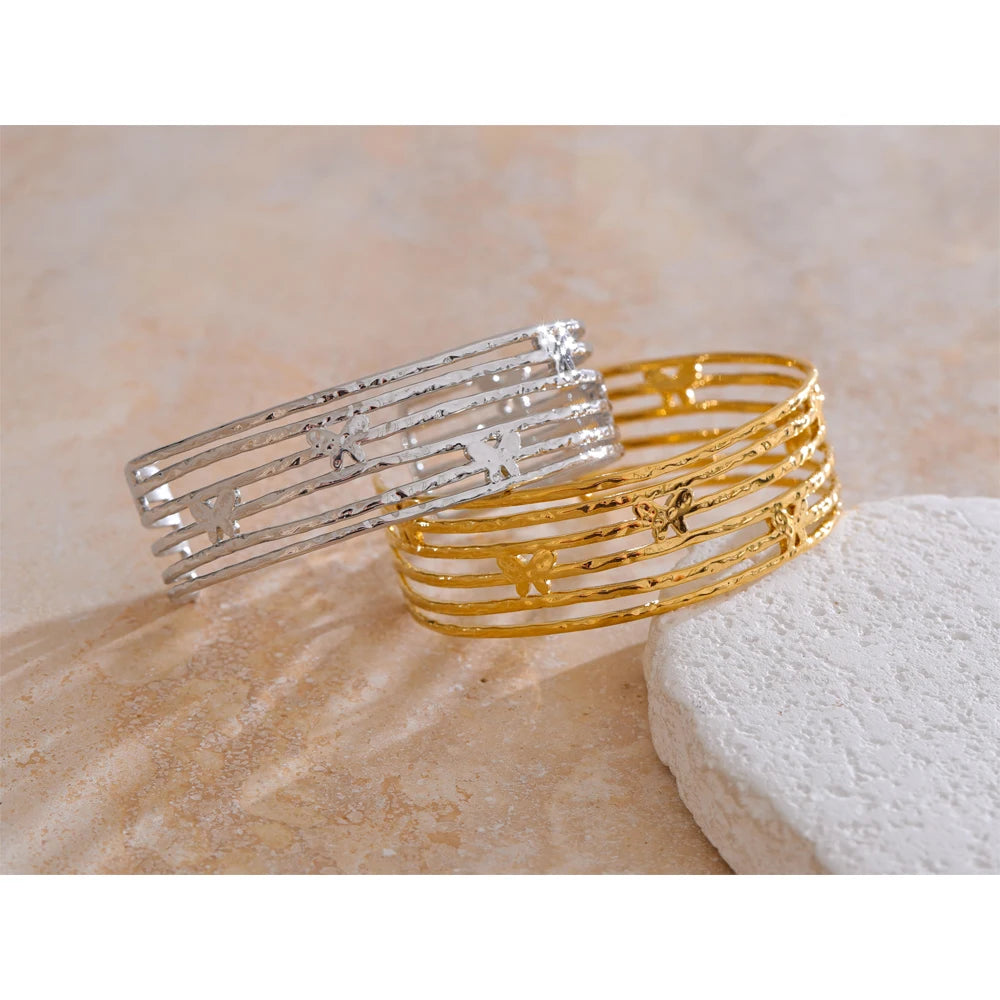 Bangle bracelet profile of a gold cuff bracelet with bracelet with gold detail