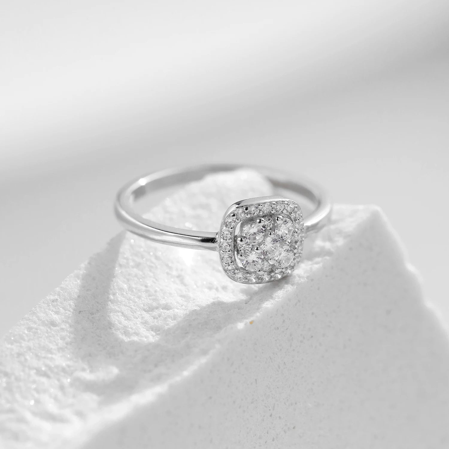 Ring and wedding band combination featuring a polished moissanite ring