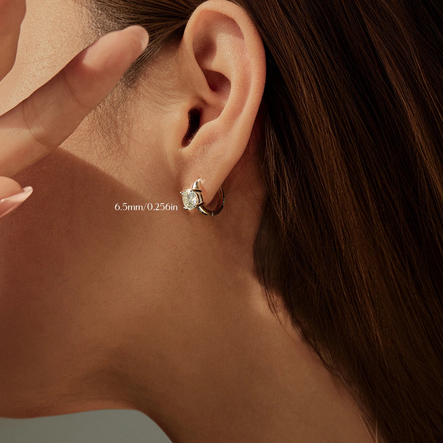 Sterling silver earrings featuring radiant moissanite diamond stones