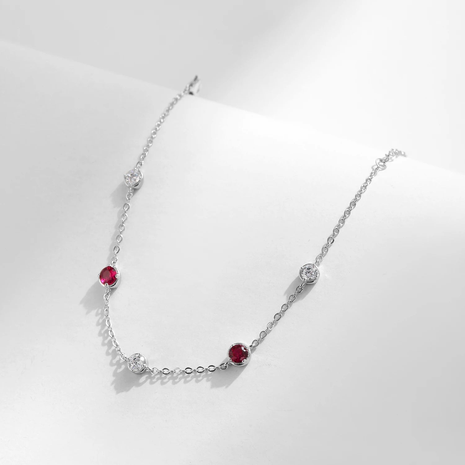 Red bracelet in sterling silver with luminous cubic zirconia accents