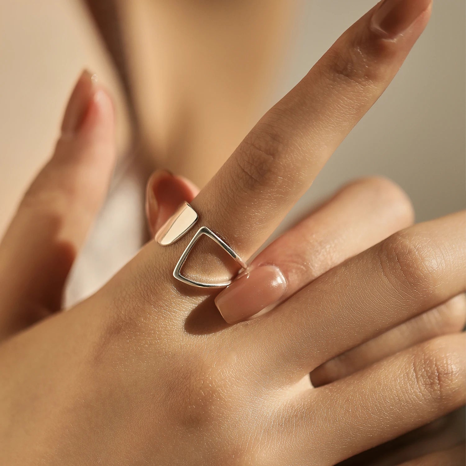 Sterling silver ring with sculptural open design and polished finish