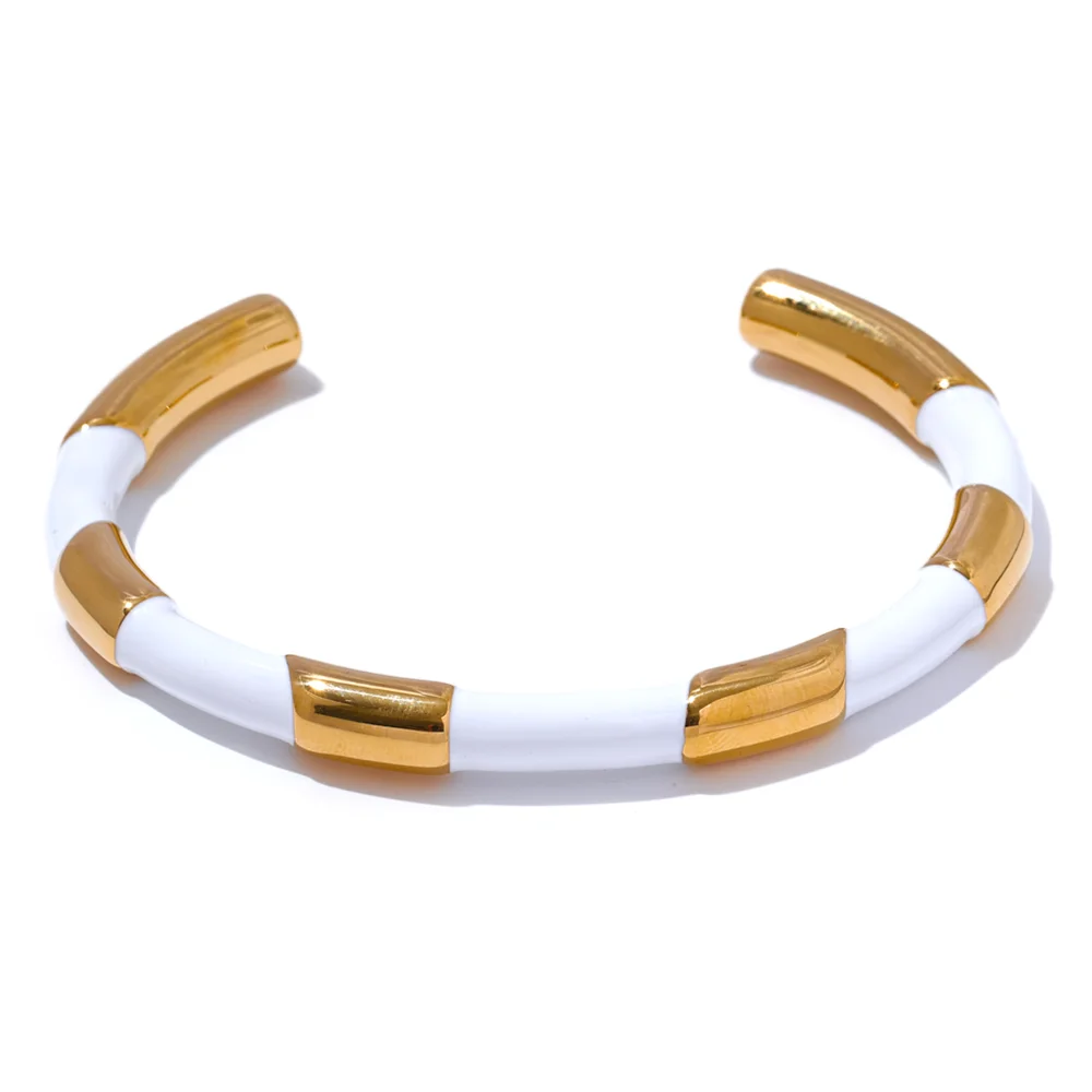 Sleek modern open cuff bracelet with two-tone enamel look