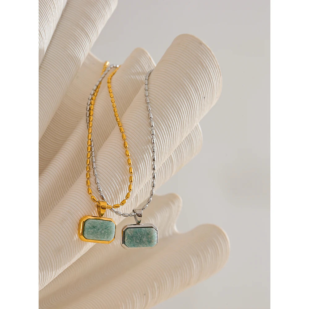 Gold plated gold i necklace featuring a soft Amazonite Stone accent