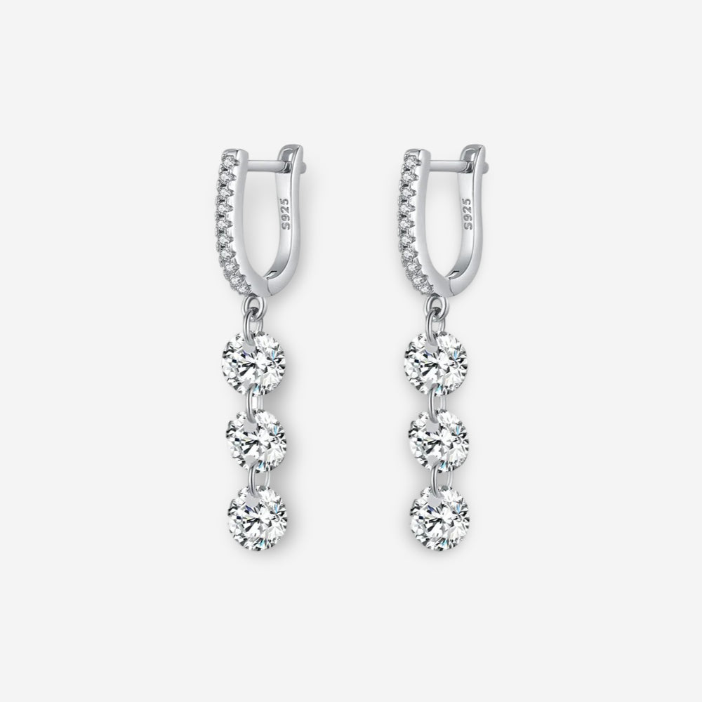 Dangle earrings in sterling silver with a refined silver color finish