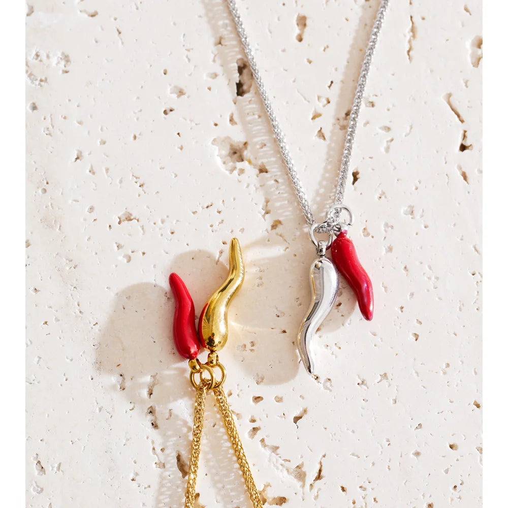 Necklace with gold finish featuring red chili enamel