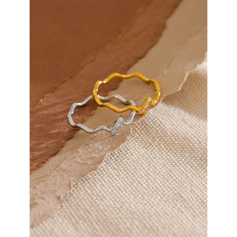 Refined stainless steel ring with brilliant cubic zirconia highlights