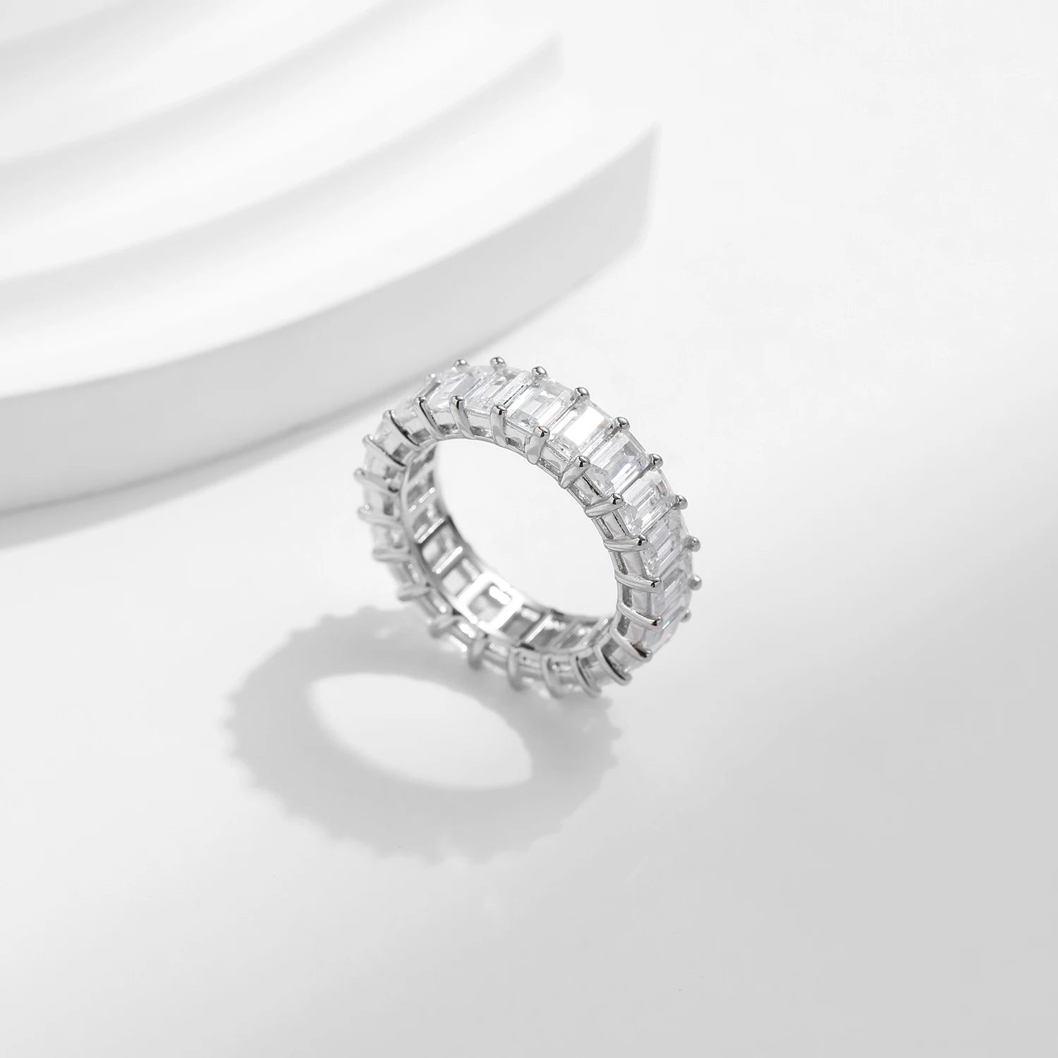 Rings wedding rings design featuring an eme rald cut centerpiece