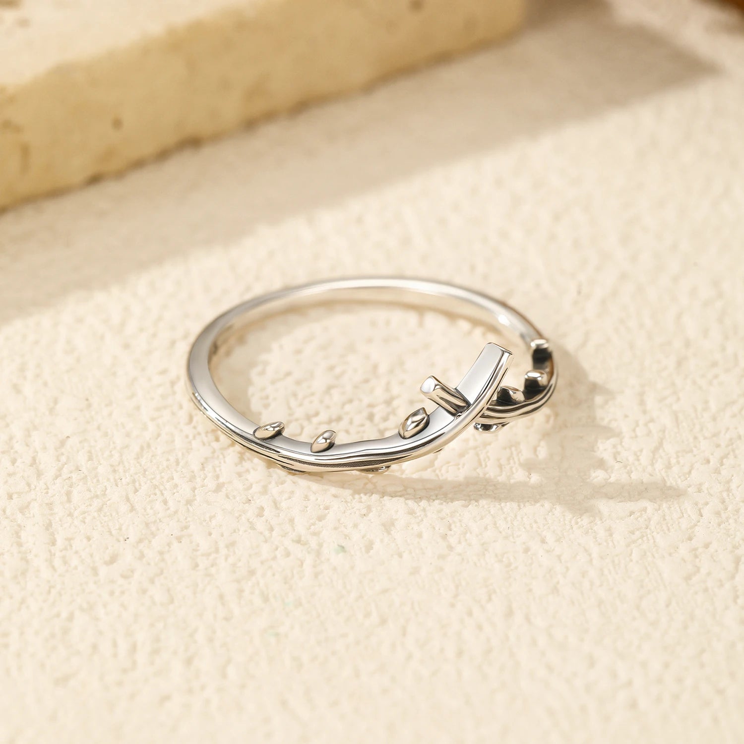 Macro shot of crossed ring details on a classic sterling ring