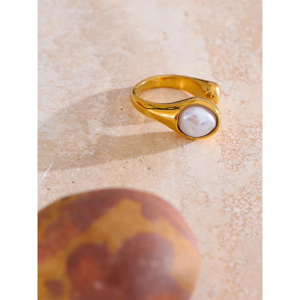 Close view of ring pearl accent on stainless steel jewelry band