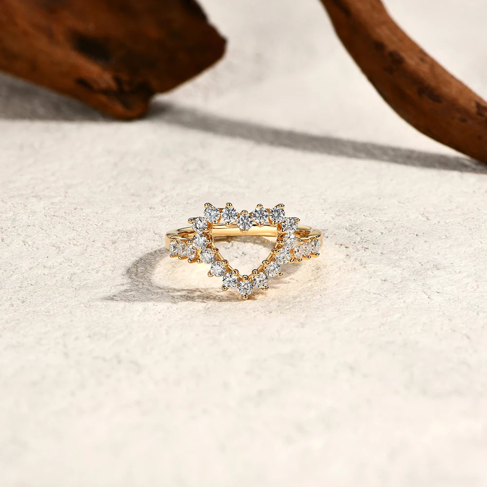 Hollow gold heart design on a moissanite ring with ring with size comfort