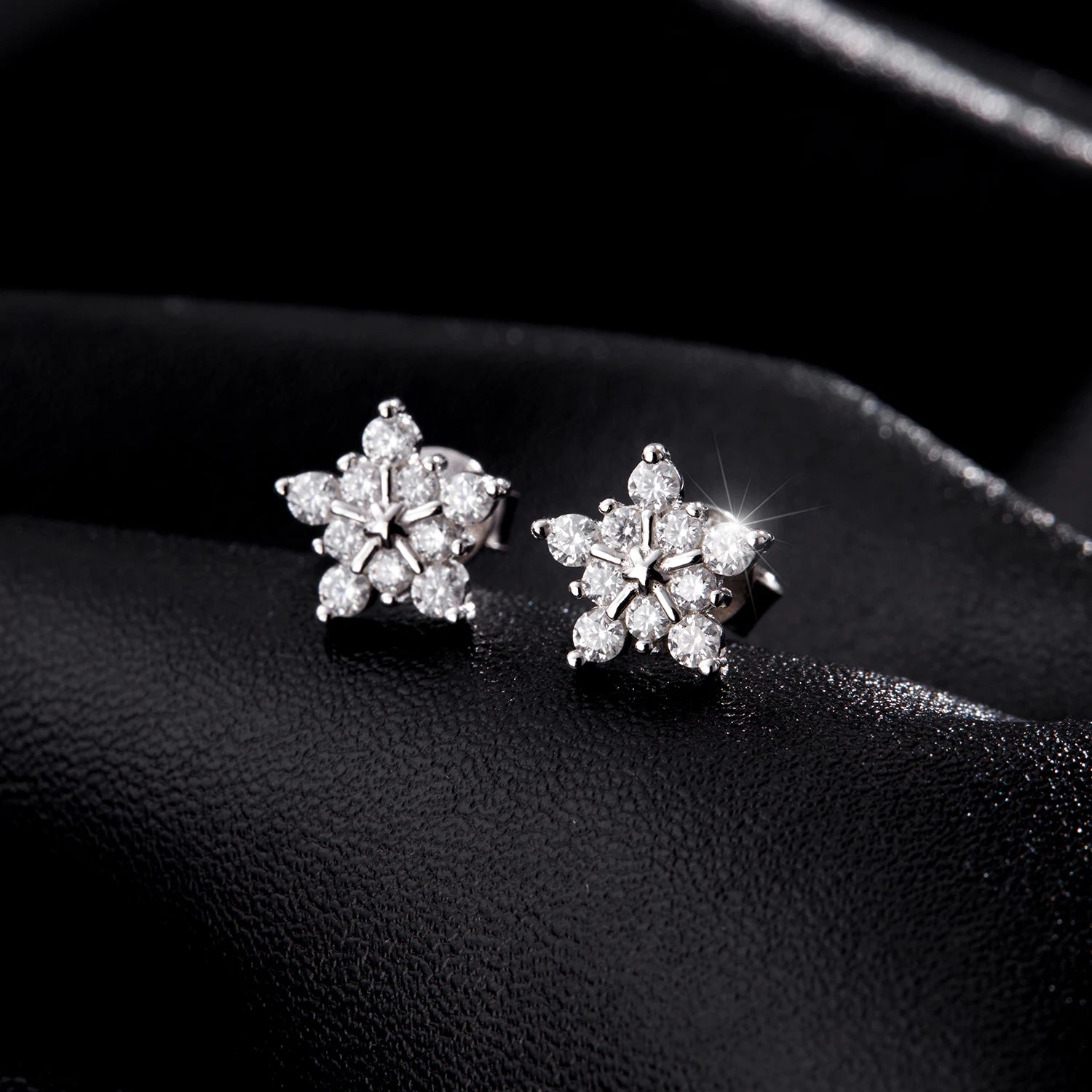 Elegant stud earrings featuring D Color moissanite stones.