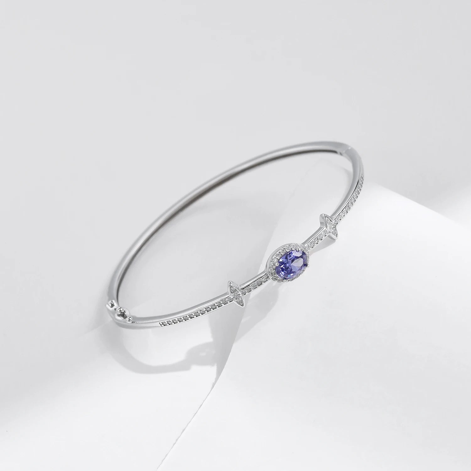 Platinum jewelry tone on a 925 sterling silver bangle bracelet