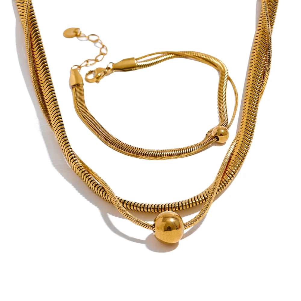 Gold plated bracelet chain paired with a sleek gold chain