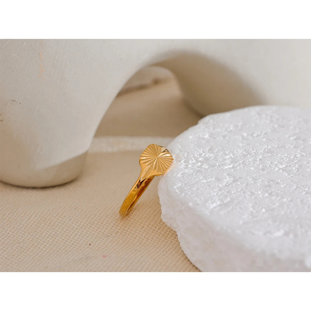 Thin ring with gold and ring size adjustability feature