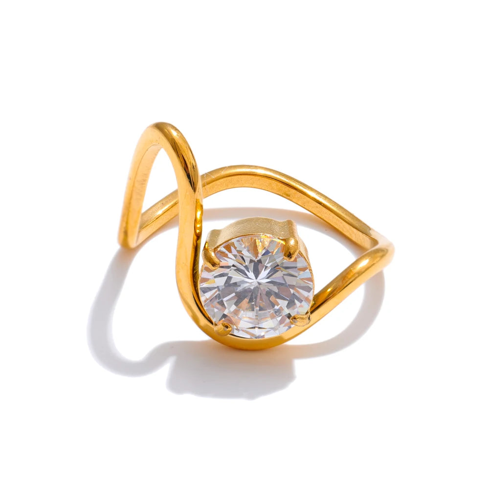 Polished gold plated ring in stainless steel jewelry captured in soft light