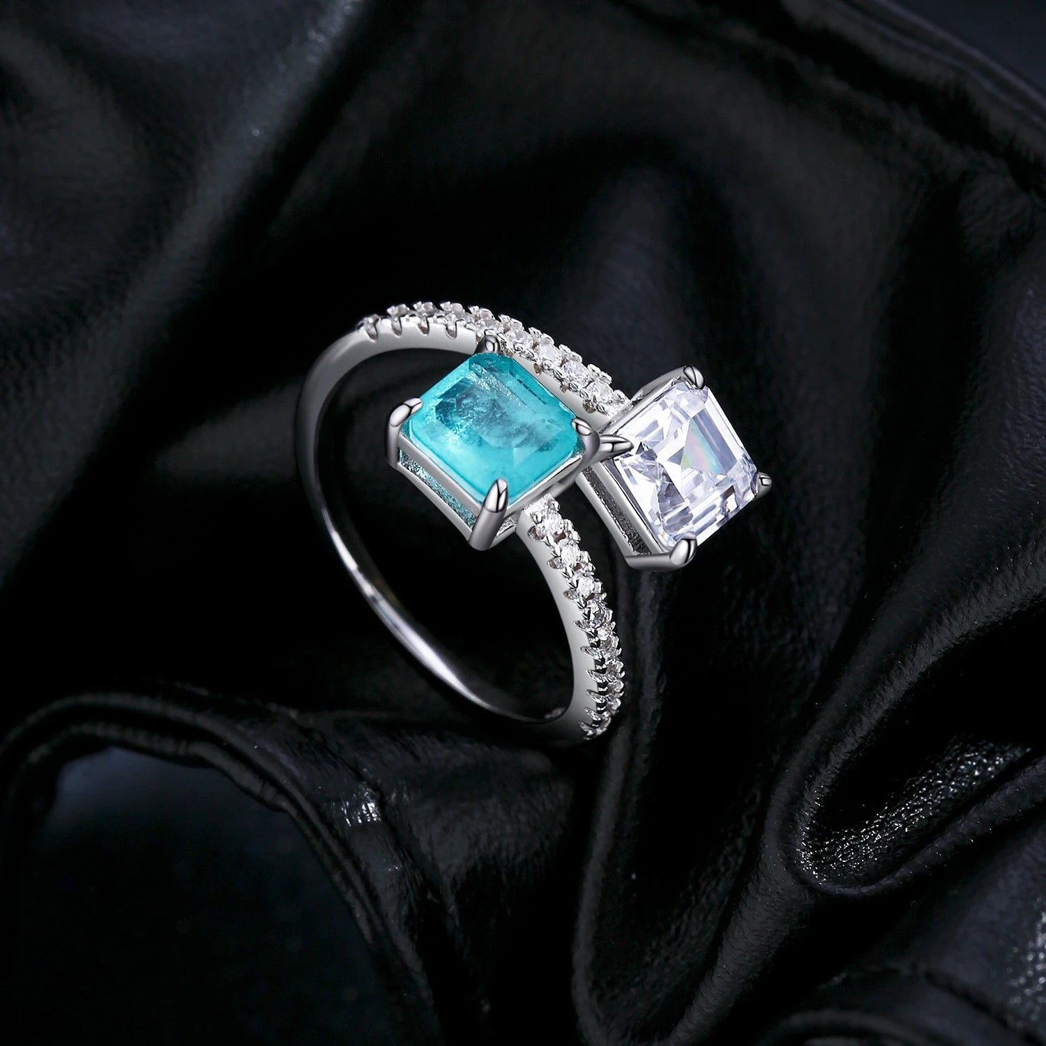 Sterling silver cz ring with vivid paraiba blue stone