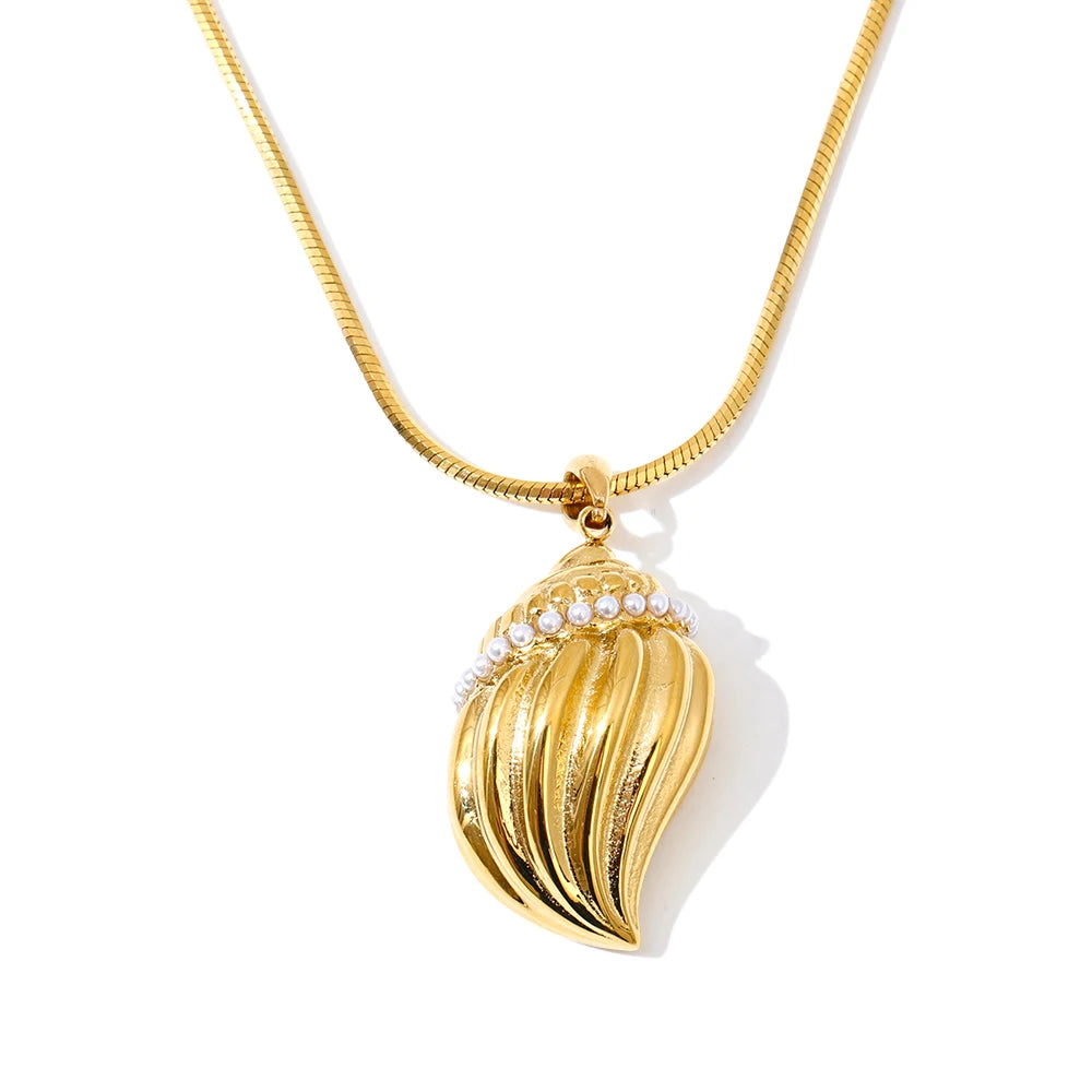 Editorial angle highlighting pendant with necklace and rings with pearls together