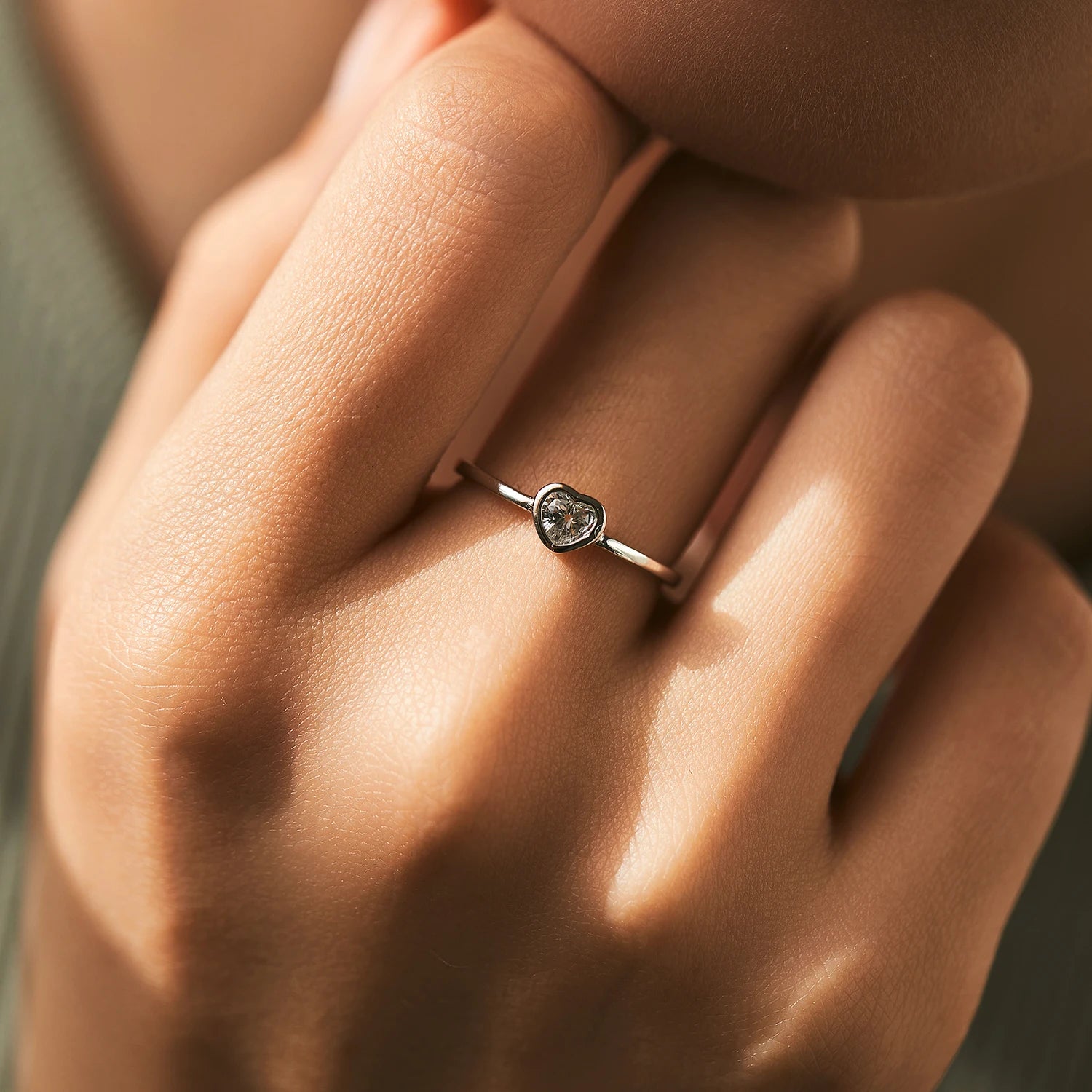 Sterling silver wedding ring with heart cut moissanite diamond