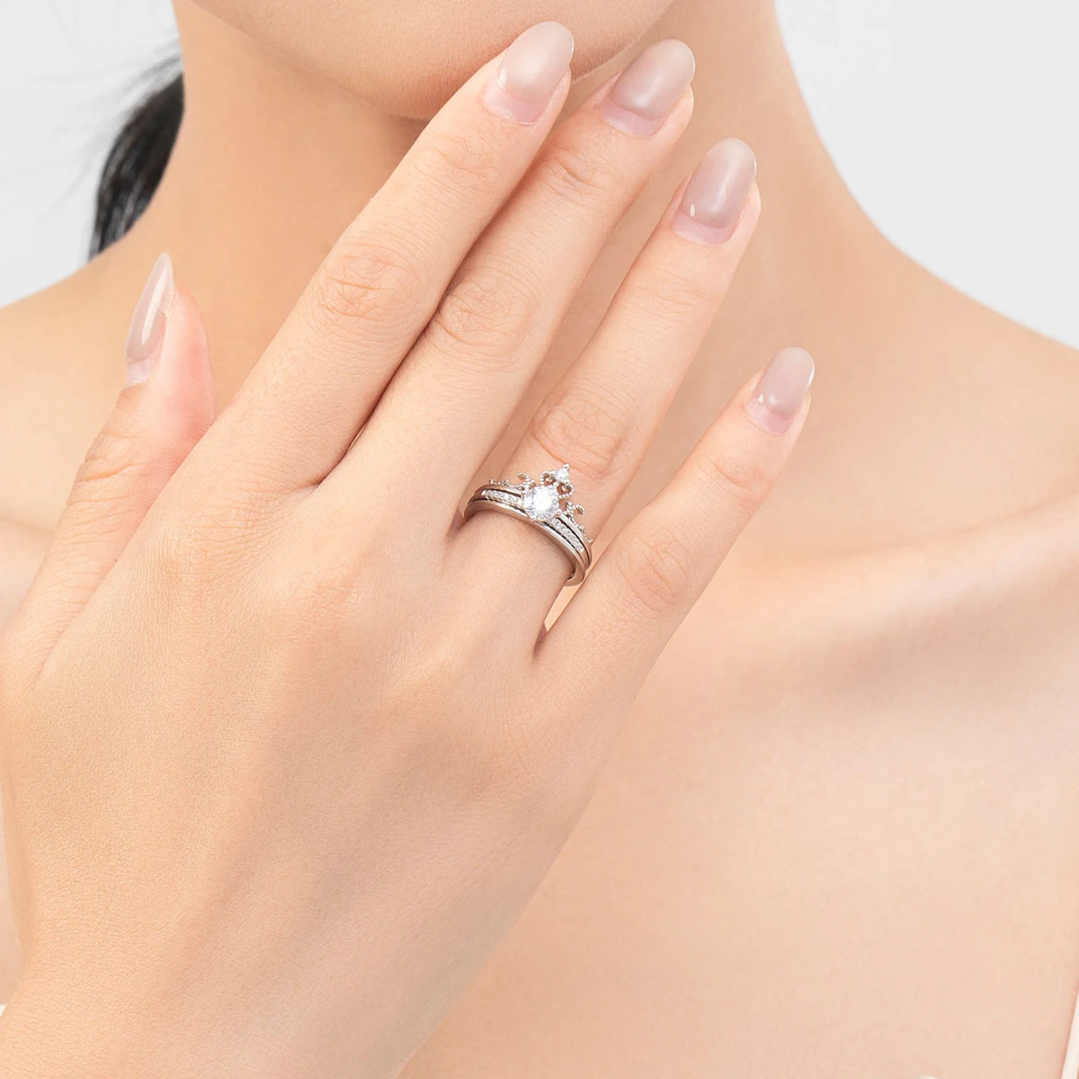 Sterling silver silver ring styled with cz rings in a classic bridal jewelry sets look