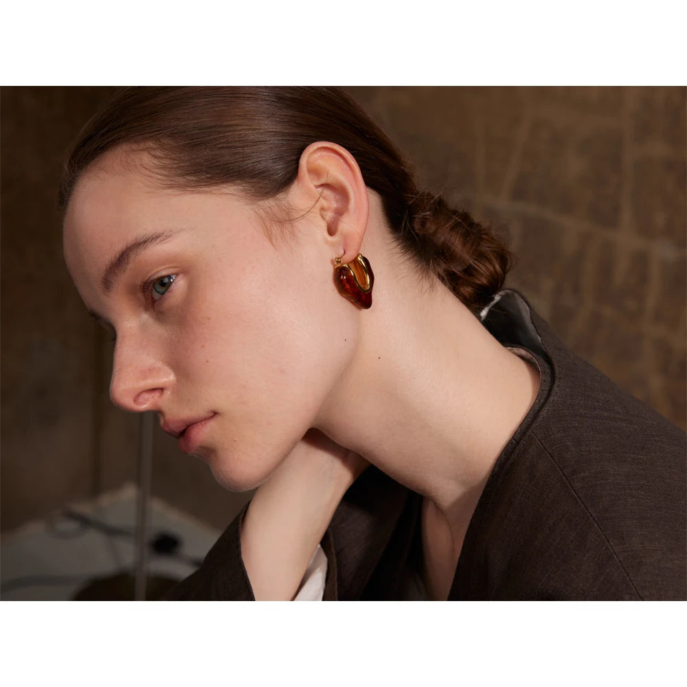 Earrings and gold resin hoops warm amber tones
