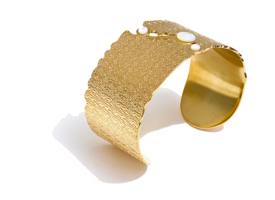 Statement cuff bracelet in gold with luminous gold plated finish