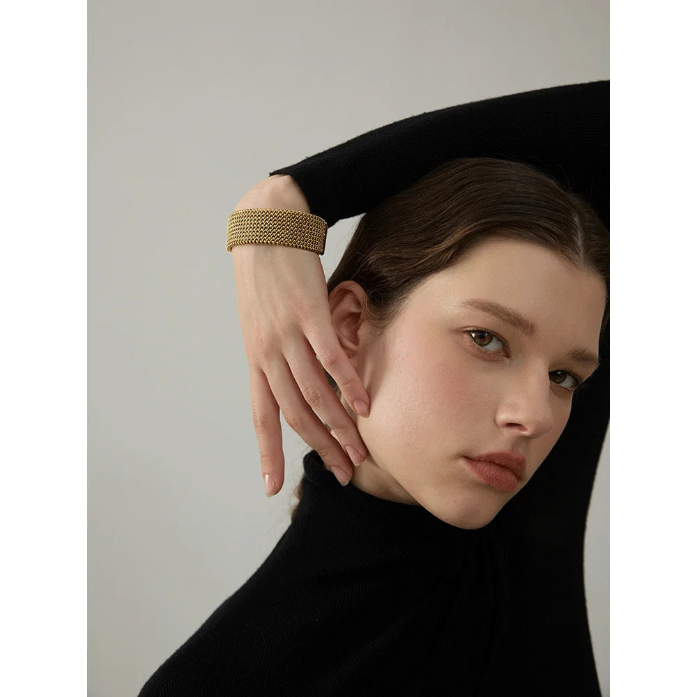 Bracelet with gold plated wide cuff and bangle bracelet style