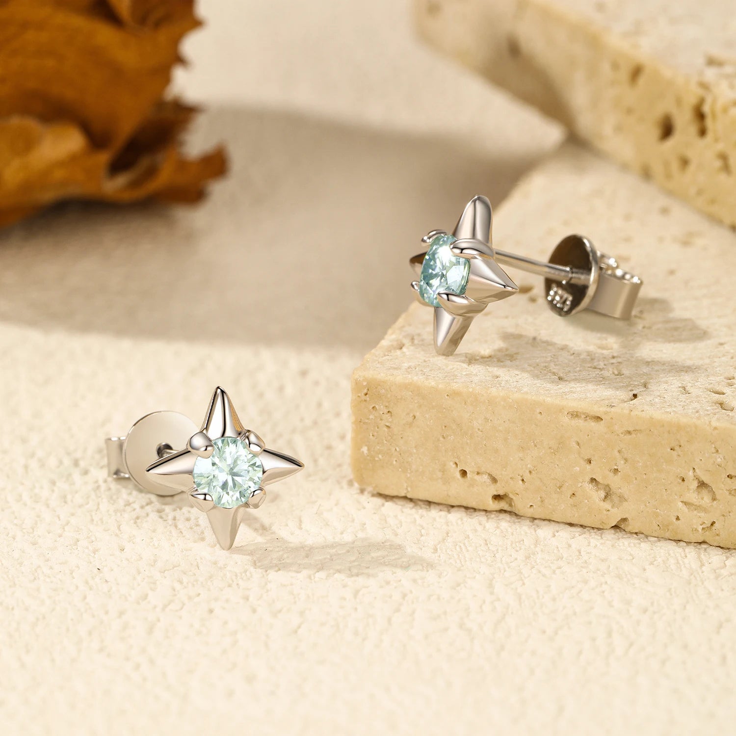 Close up of moissanite ear studs crafted in 925 sterling silver