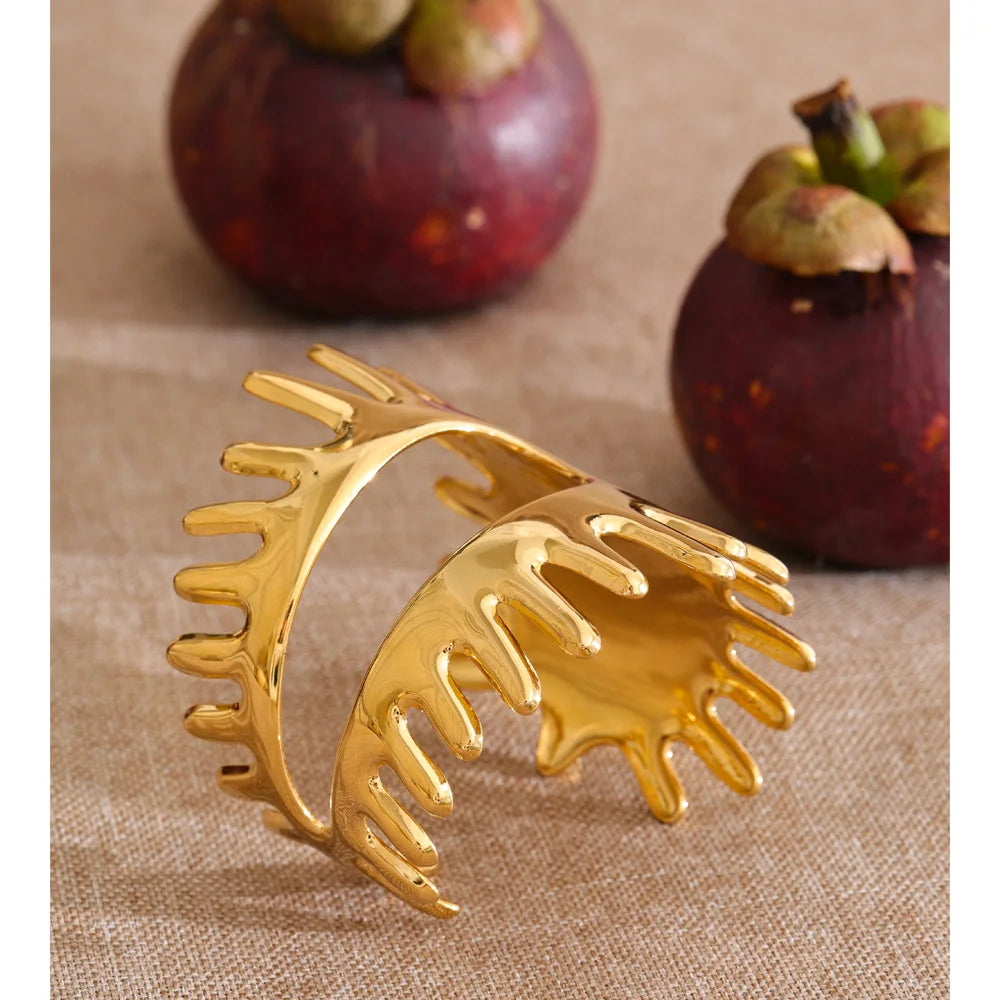 Bold gold bracelet bracelet with geometric hollow design