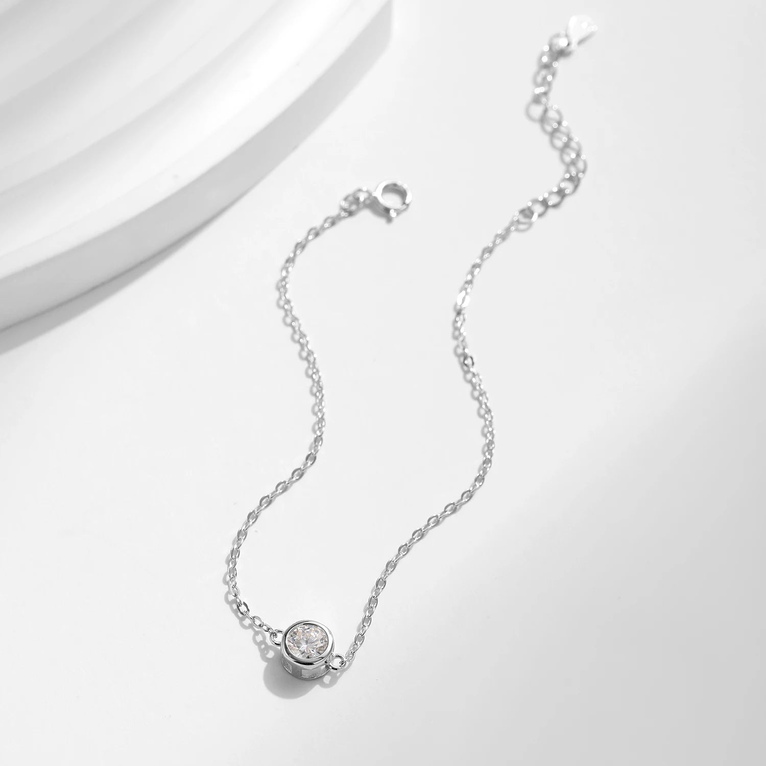 0.5CT detail illuminating a refined moissanite chain bracelet