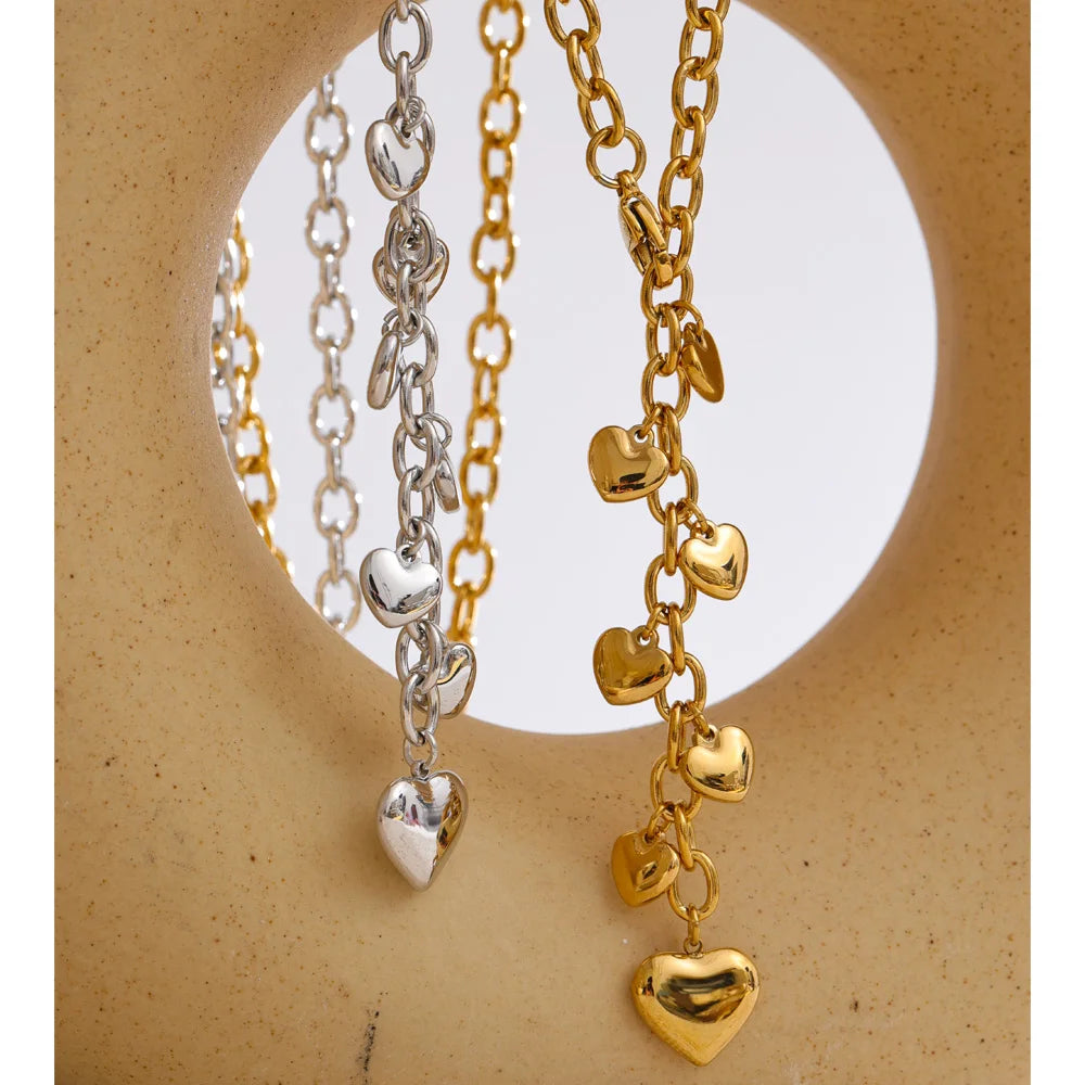 Women wearing platinum plated heart necklace charm accessory