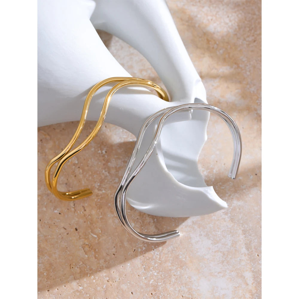 Women’s gold cuff bracelet with adjustable bangle style