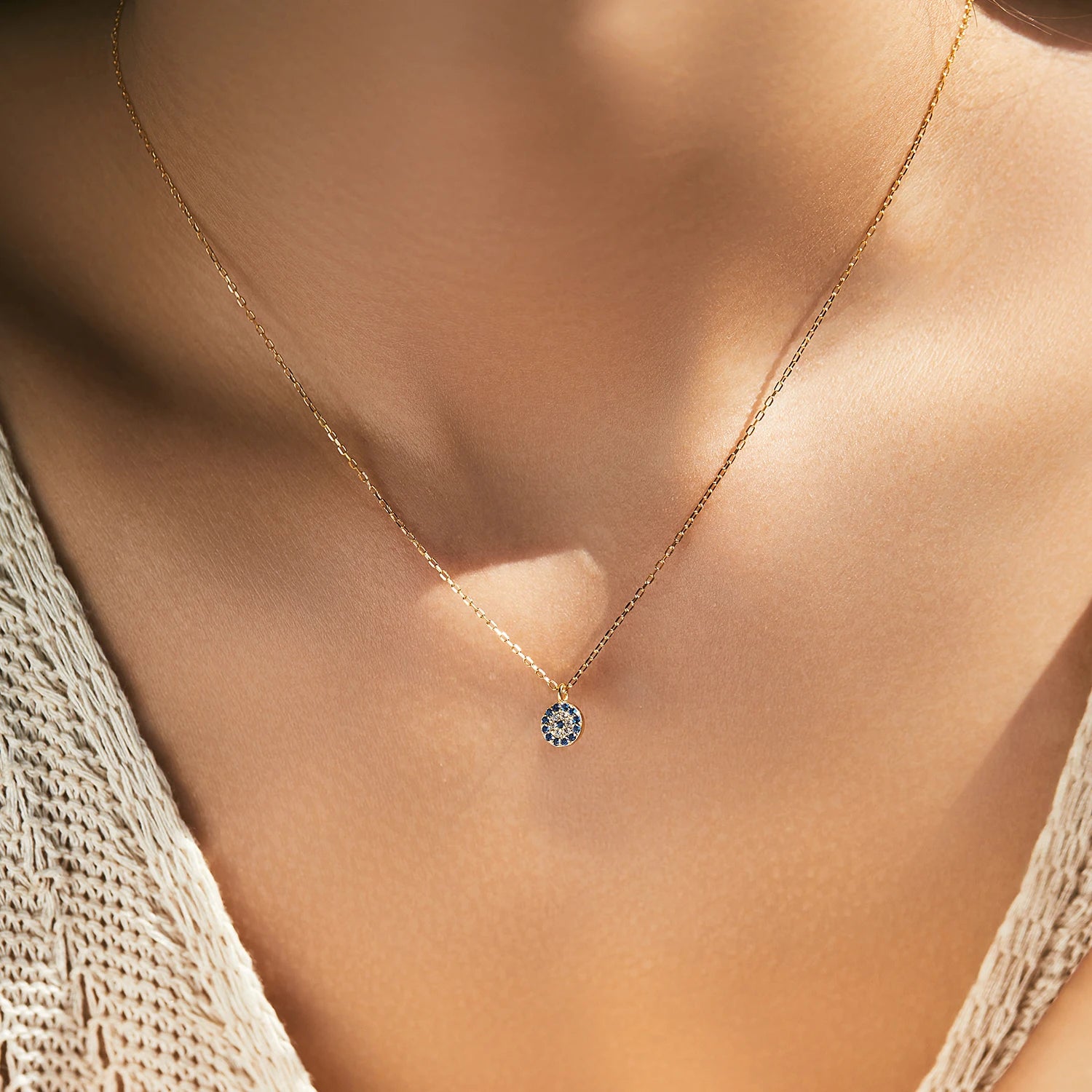 Sterling silver necklace with zirconia evil eye pendant