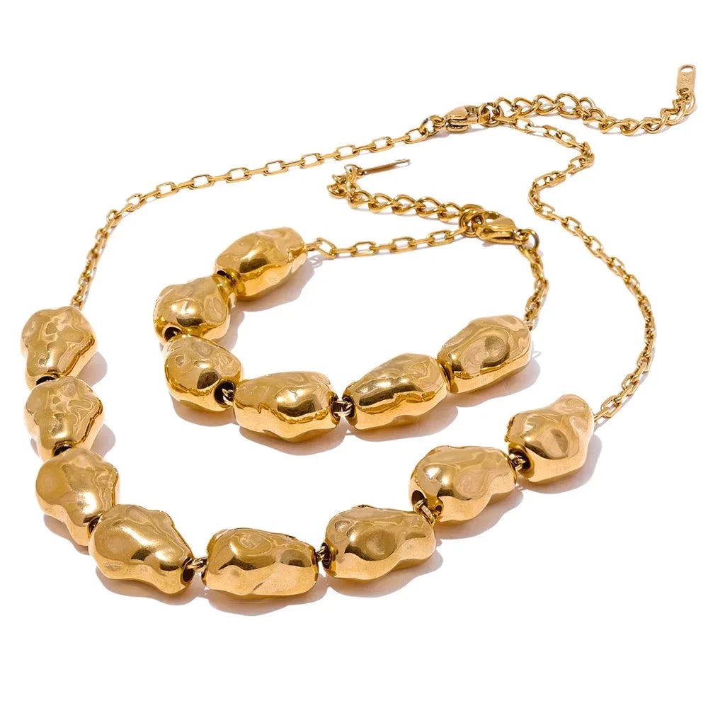 Gold plated necklace and bracelet set styled for gold jewellery layers