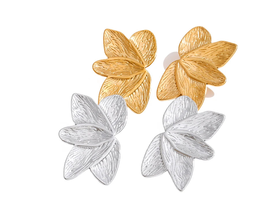 Stylish gold plated flower studs paired with outfit