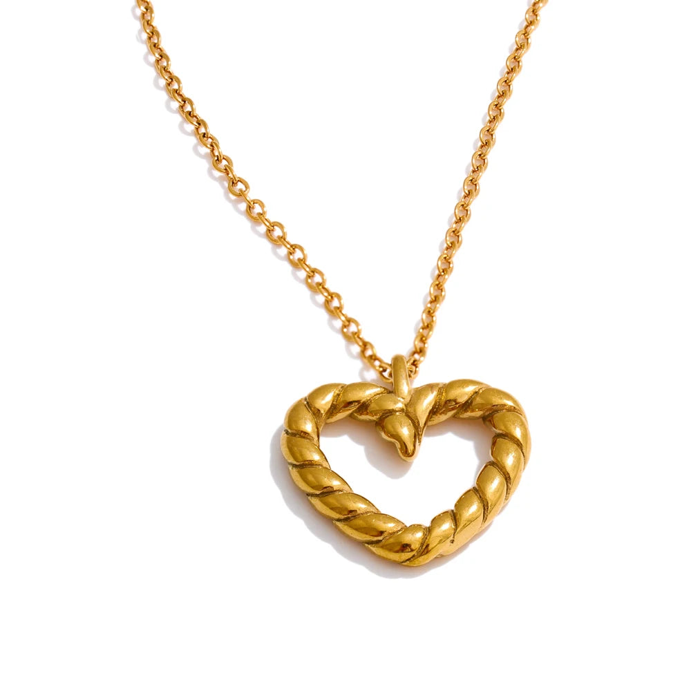 Stainless steel jewelry chain holding a refined necklace heart