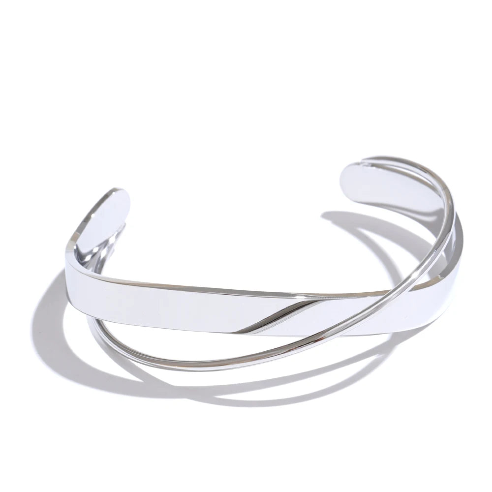 Refined gold jewelry look using a gold cuff bracelet