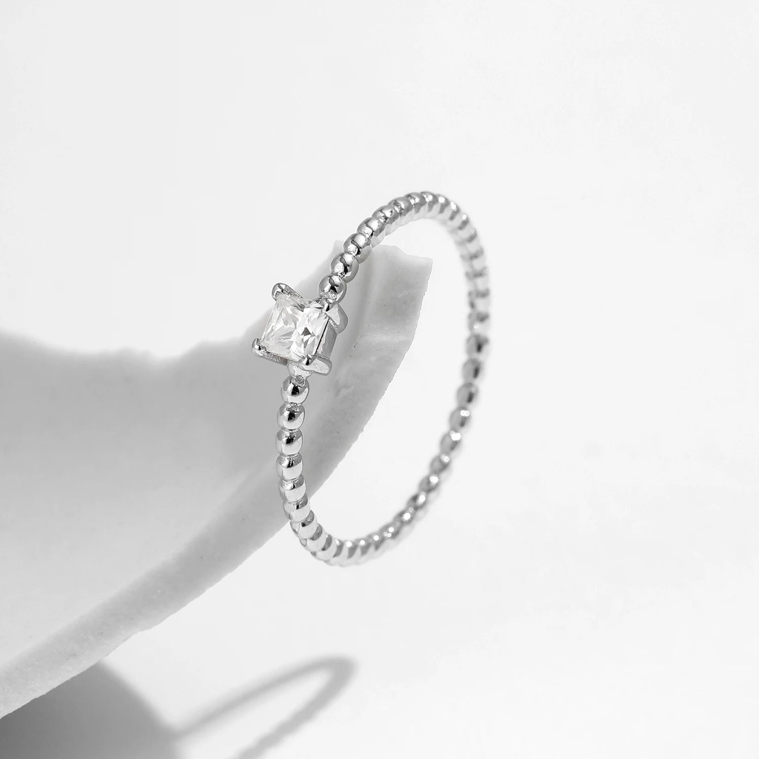 Close view of moissanite jewelry rings sparkle on an engagement ring