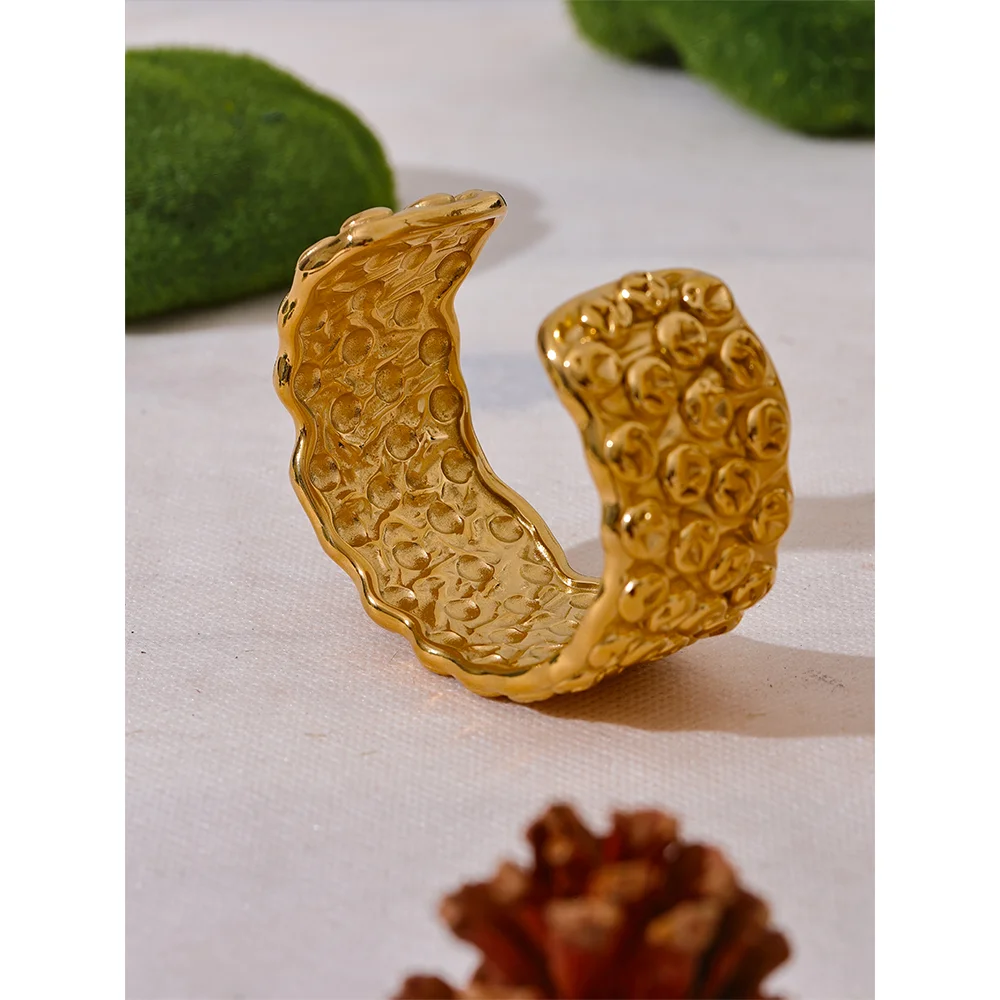 Minimal stainless steel jewelry cuff bracelet in gold with polished edge