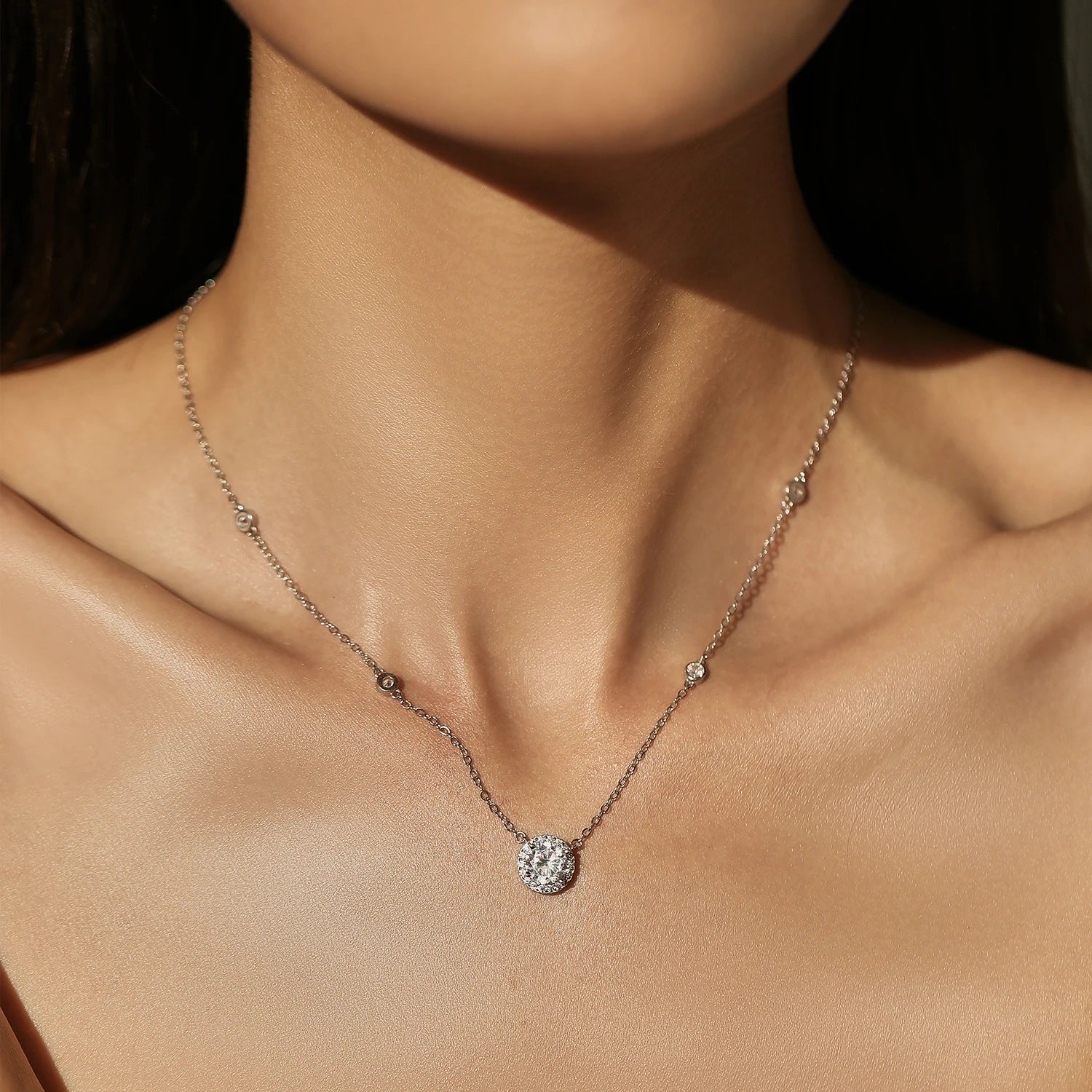 Sterling silver necklace with a subtle charm necklace accent