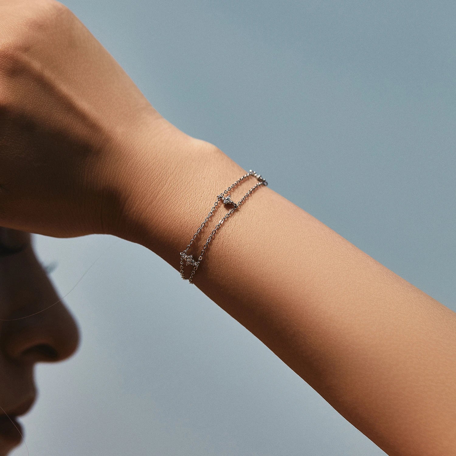 925 sterling silver bracelet paired with a delicate bracelet chain