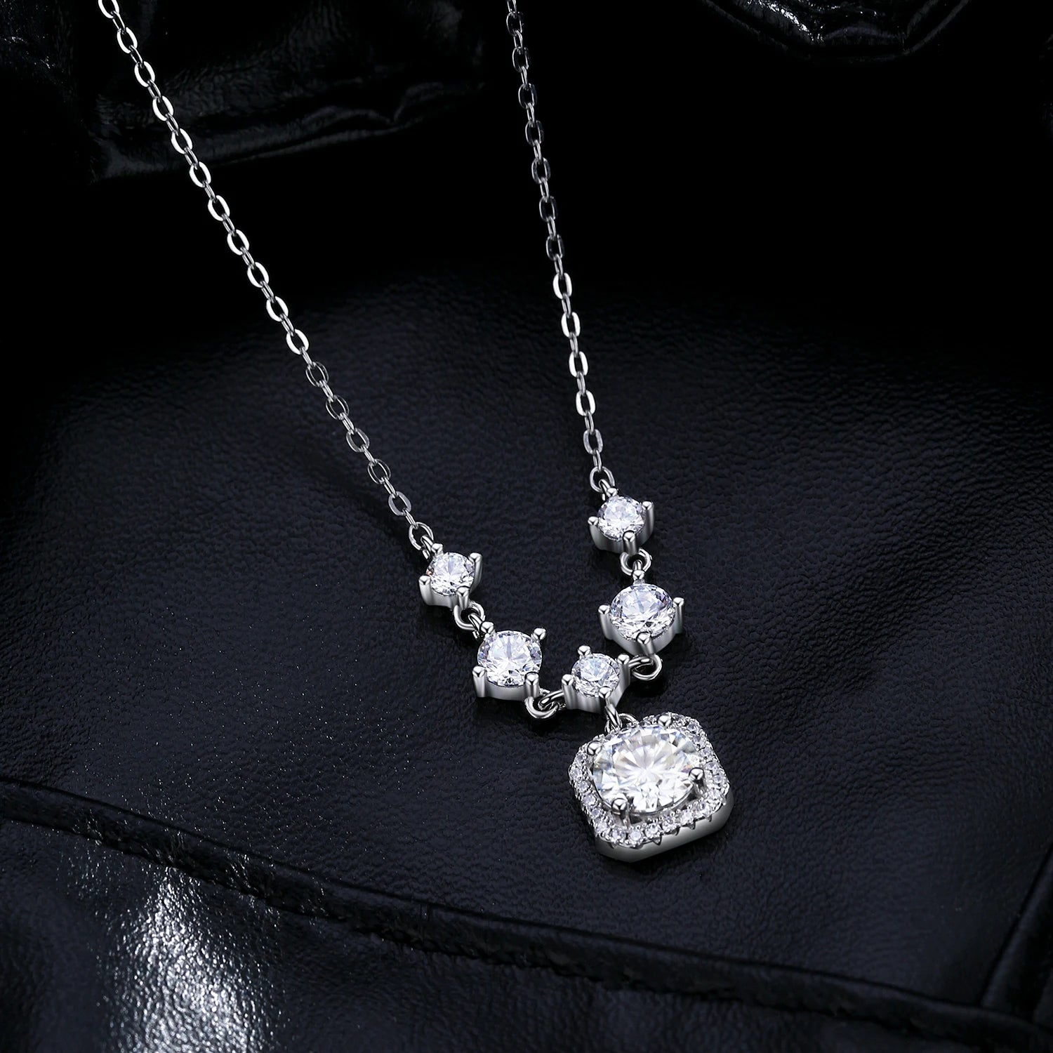 Charm necklace feel in a refined moissanite necklace for evening wear