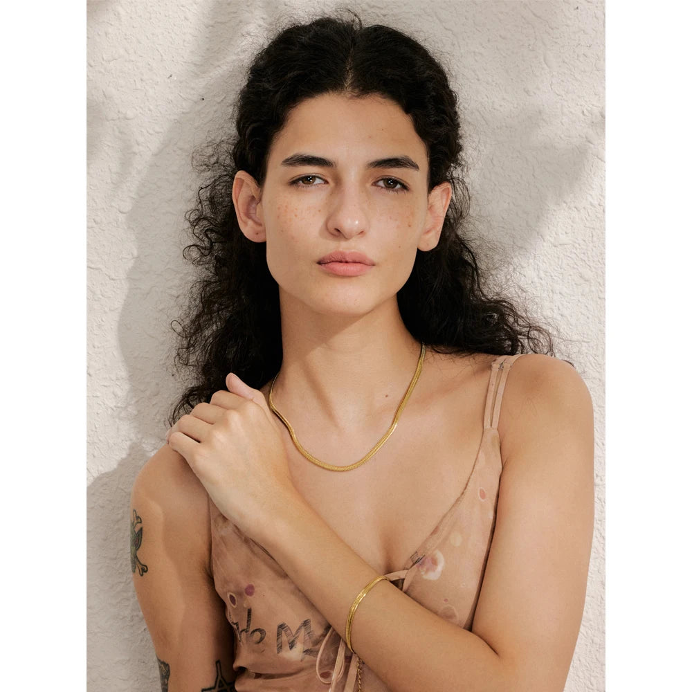 Close-up of gold chain necklace necklace plated in stainless steel